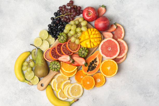 istock Top view of rainbow fruits and berries 920957010
