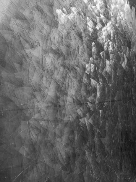 istock Background of broken glass fragments, macro 920957926