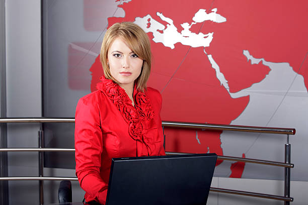 Real television reporter with braking news stock photo