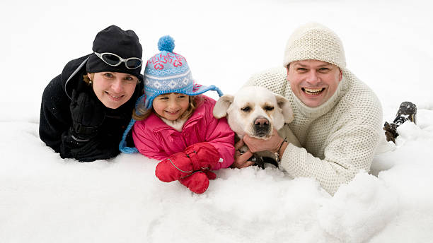 istock Familly with dog in snow 92096327