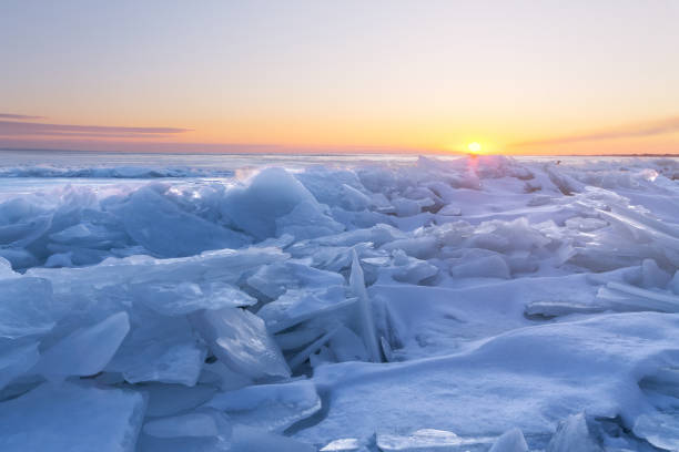 istock dawn at the frozen lake shore 920965296