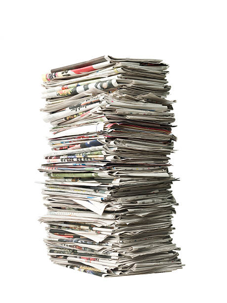 Pile of newspapers stock photo