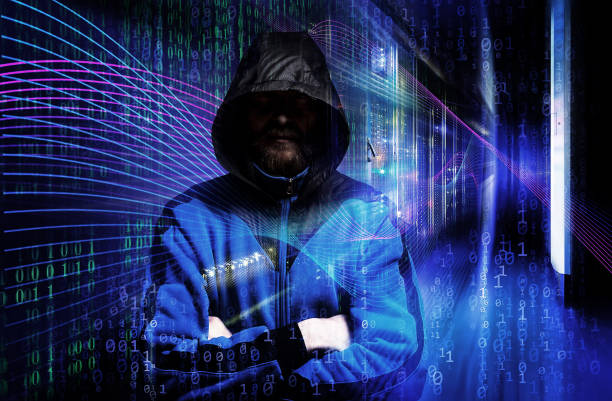 istock Man in hoodie shirt is hacker. Computer security concept. abstract image of Light traces. visualization hacker attacks on information data server 920967340