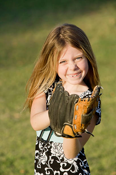 istock Cute young girl with a baseball 92097147