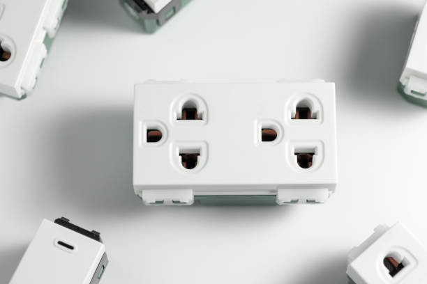 istock New Electric Socket with Plate unplug or plugged in concept on white background 920971688
