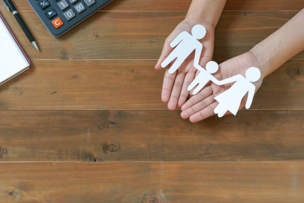 istock Top view of hands holding car paper with calculator and notebook 920971920