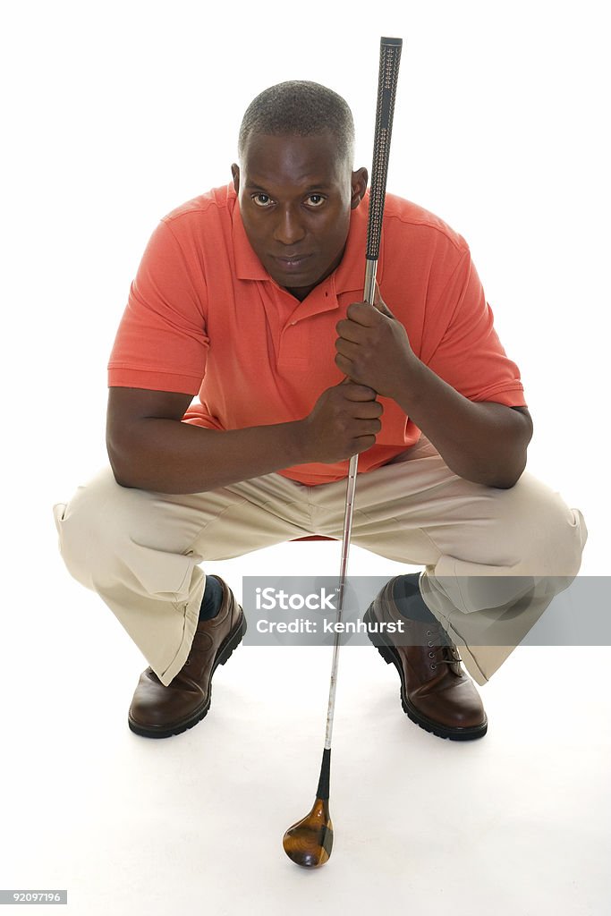アフリカ系アメリカ人男性の保持ゴルフクラブ - アフリカ系アメリカ人のロイヤリティフリーストックフォト