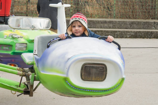 istock Real people little boy in amusement park 920972108