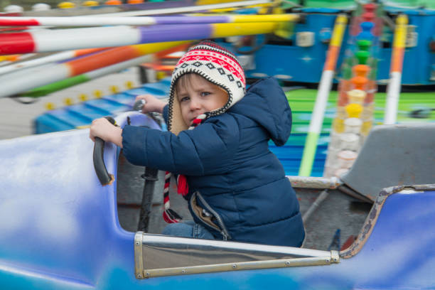 istock Real people little boy in amusement park 920972446