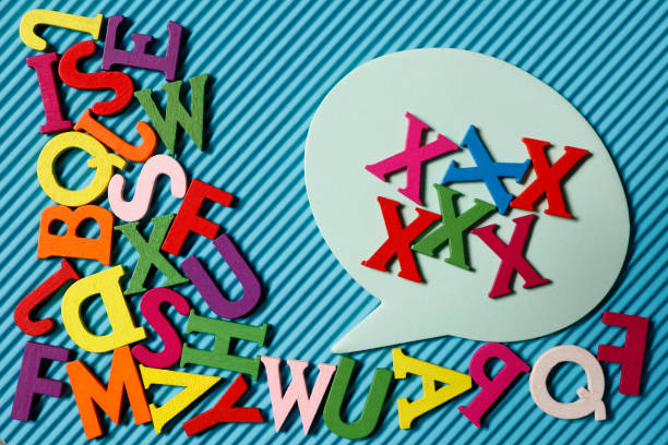 istock Colorful wood alphabet letters on blue background 920974964