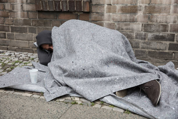 istock Homeless Man Sleep On Street 920978734