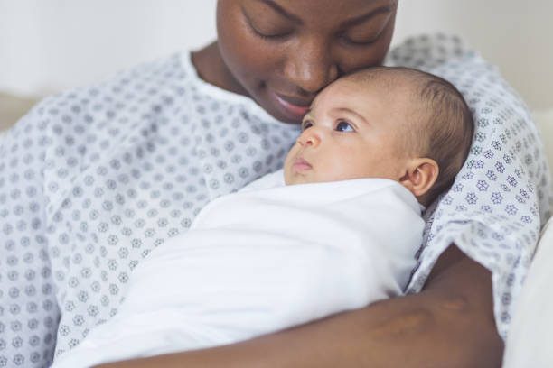 istock New Mom Holds Her Infant to Her Chest 920978832