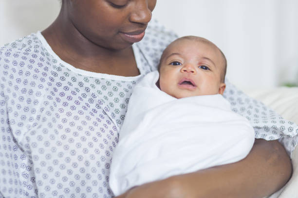 istock New Mom Holds Her Infant to Her Chest 920978840