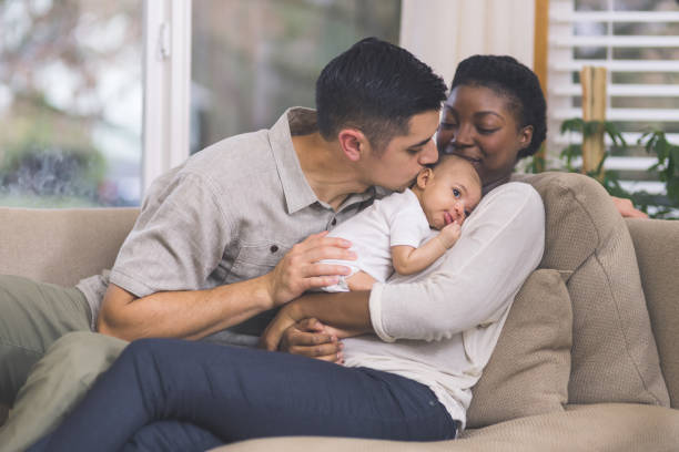 istock New Mom Holds Her Infant to Her Chest 920978842