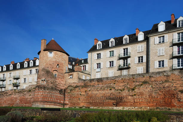 istock Antique boundary wall renewed and modern houses, Le Mans 92097942