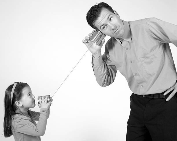 ouvir-me pai - telephone can communication tin can phone imagens e fotografias de stock