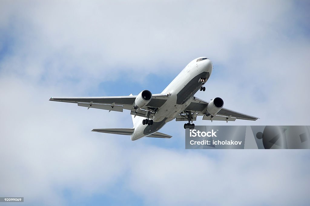 Non indiqué blanc large à jets massants - Photo de Avion libre de droits