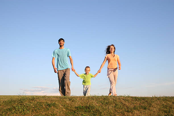 istock running family on meadow 3 92099153