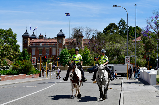 Perth, WA, Australia - November 30, 2017: Mounted police, two police man on horses in the capital of Western Australia