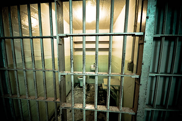 istock View through the bars of a prison cell at Alcatraz Island 92099412