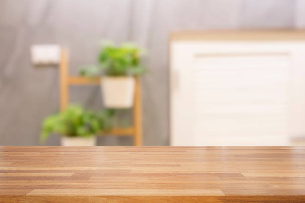 istock Empty wooden table with living room background 920998108