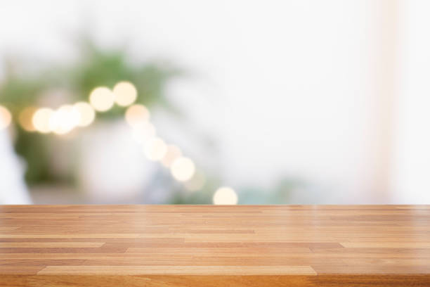 istock Empty wooden table and green plants 920998132