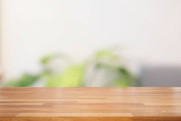 istock Empty wooden table with living room background 920998216