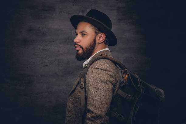 istock Black man in a suit and a felt hat. 920998534