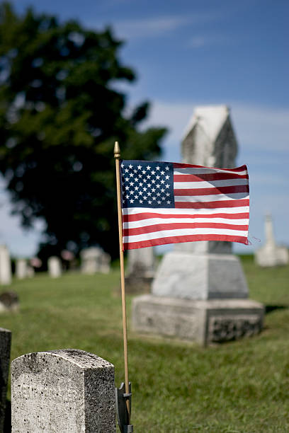 Cemetery in the country with flag stock photo