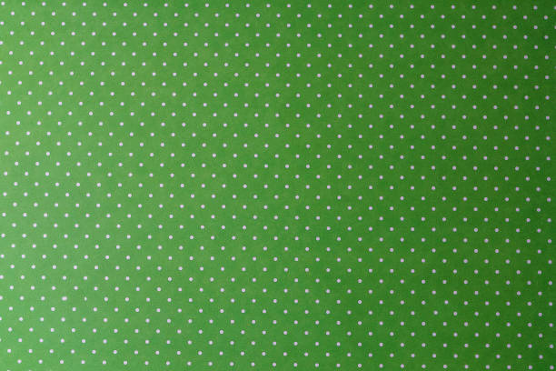 istock Green  textured paper with circlle pattern, for background, close up.