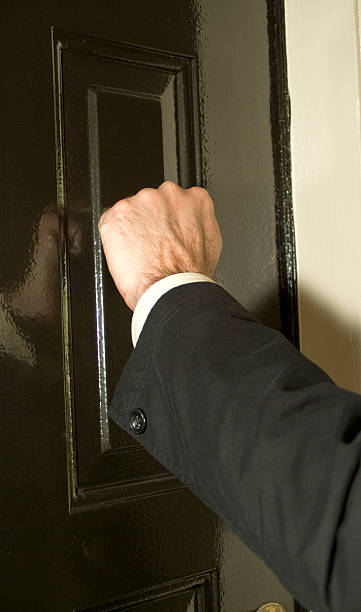 istock A person knocking on the door  92102227