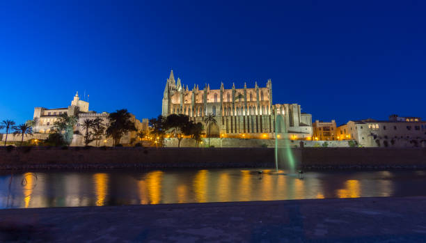 istock Palma de Mallorca Cathedral sunset, reflected in water 921023274