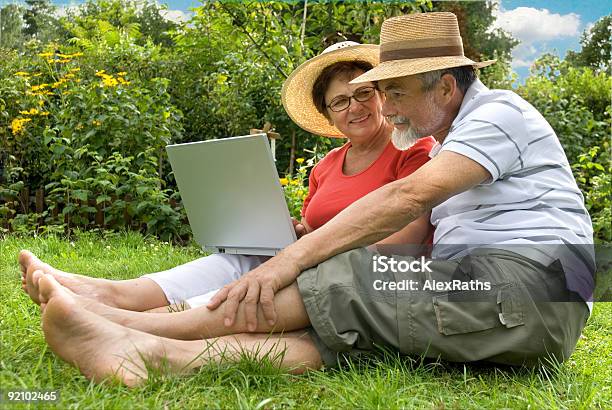 Senior Couple In Garden Stock Photo - Download Image Now - Active Lifestyle, Active Seniors, Adult