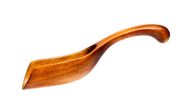 Wooden cooking shovel for bulk materials. Kitchen equipment. Sho Wooden cooking shovel for bulk materials. Kitchen equipment. Shovel for spices. sho instrument stock pictures, royalty-free photos & images
