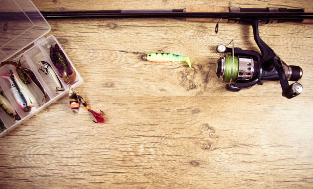istock Fishing equipment. Spinning method. A place for an inscription. 921026440