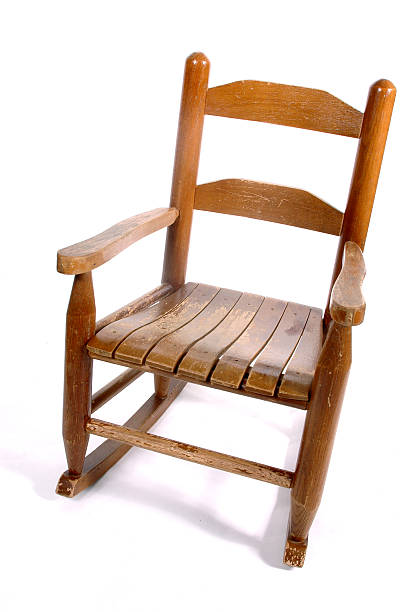 istock Old worn child’s rocking chair 92102646