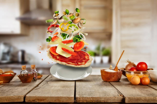 Flying food ingredients with pizza.