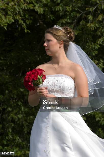 Bride Holding Bouquet Stock Photo - Download Image Now - Adult, Beautiful People, Beautiful Woman