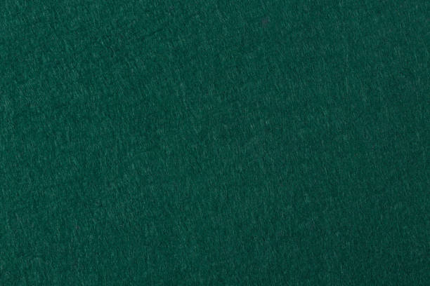 istock Green felt background. Useful for poker table or pool table surf 921029066