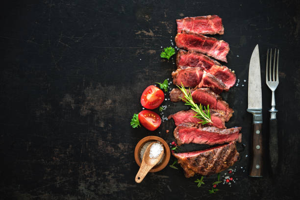 istock Sliced medium rare grilled beef ribeye steak 921029458