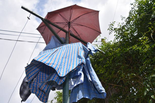 istock An umbrella keeps the clothes from getting wet 921029480