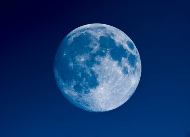 istock High contrast Full moon seen with telescope 921029834