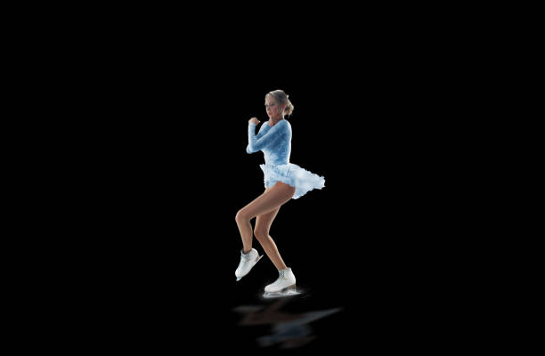 istock figure skater isolated on black 921032534