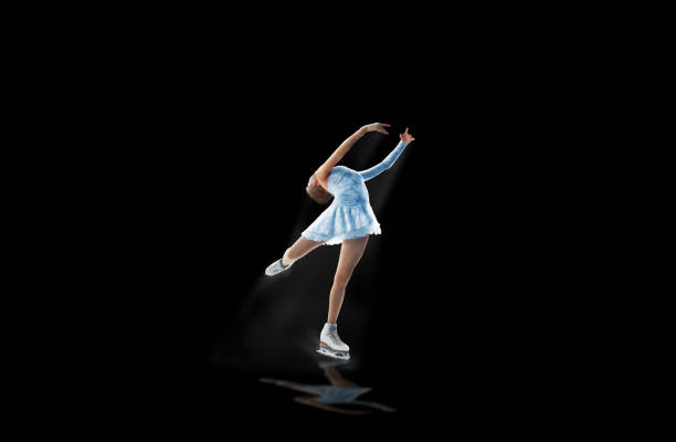 istock figure skater isolated on black 921032582