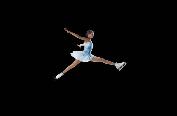 istock figure skater isolated on black 921032614