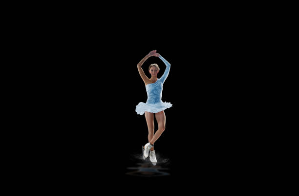 istock figure skater isolated on black 921032642