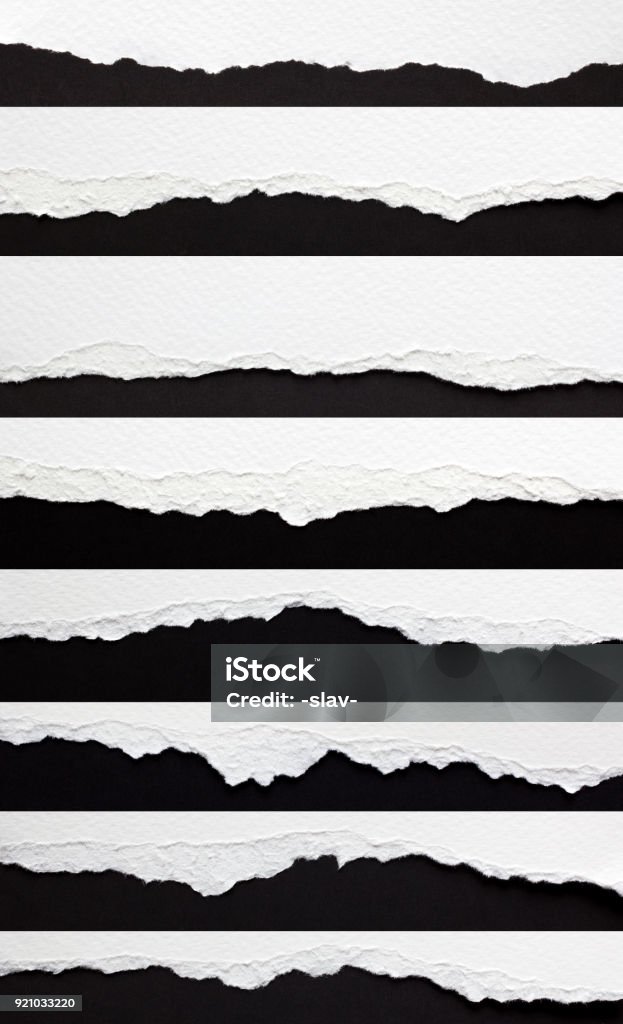 set of torn paper edges set of torn paper edges isolated on black Torn Stock Photo