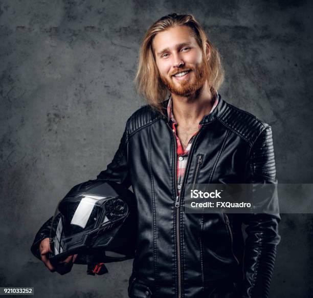 A Man In Leather Jacket Holds Motorcycle Helmet Stock Photo - Download Image Now - Adult, Adults Only, Adventure - iStock A Man In Leather Jacket Holds Motorcycle Helmet Stock Photo - Download Image Now - Adult, Adults Only, Adventure - iStock