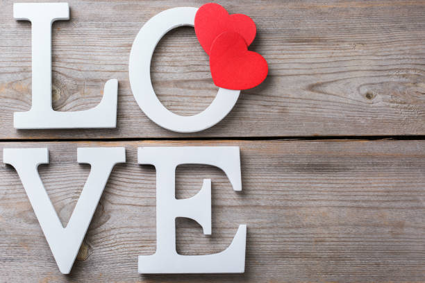 istock Valentines day holiday letters text message love card background 921036732