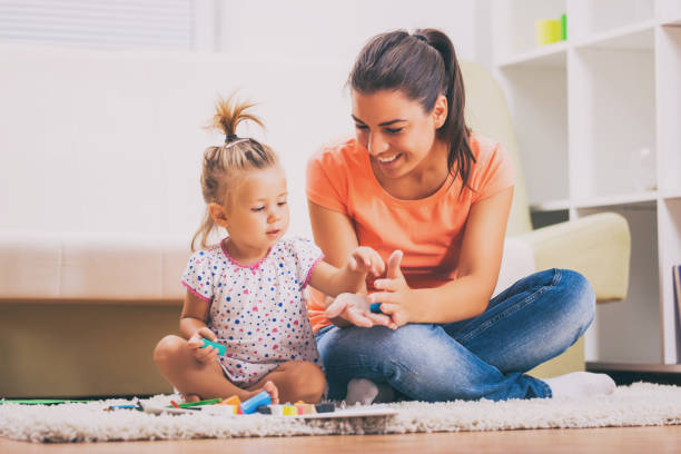 istock Mother and daughter at home 921038858